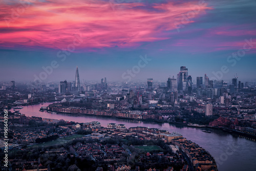 Photography Elevated view of the urban skyline of London, UK, during winter dawn with fog an