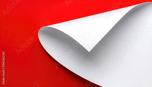 A close-up view presents a red background with a section of the top-right paper edge elegantly curled over, revealing white