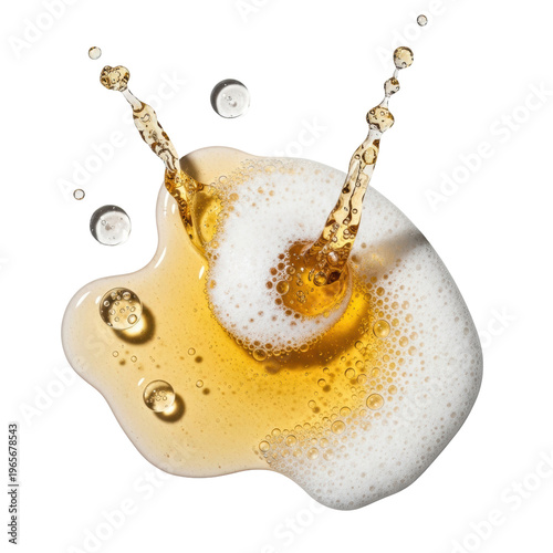 Spilled golden light lager beer with white foam splashing on a transparent background, frozen droplets in mid-air, overhead view. Concept for beverage advertising