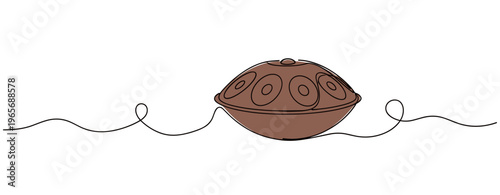 Handpan drum resting on continuous line surface in brown. no editable strokes