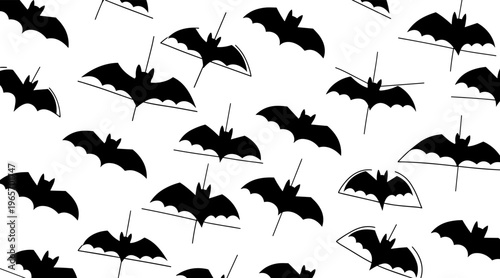 Black bat silhouettes flying across seamless white pattern, no seamless