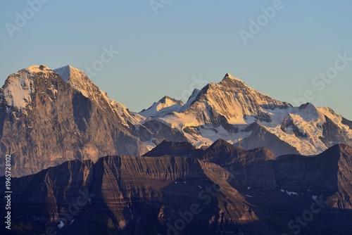 Eiger North Face with Eiger, Monch and Jungfrau mountains in the morning light, Brienzer Rothorn Mountain, Brienz, Switzerland, Europe
