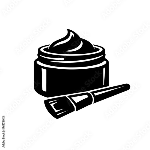 Black cream cosmetic product with applicator brush for skincare and beauty routine on white background