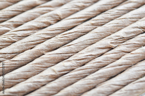 Close up of the surface of woven natural fibers used as a sample in industrial applications.