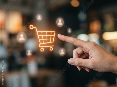 Hand touching glowing e-commerce shopping cart digital icon