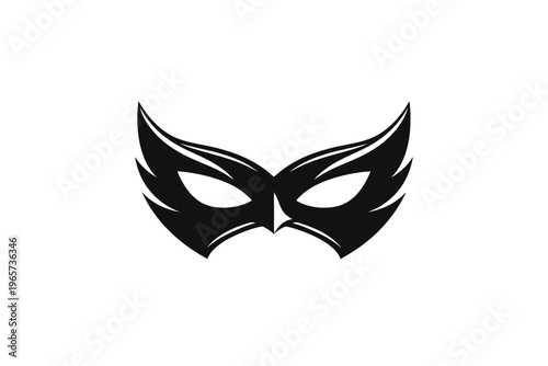 A mysterious black mask with wing-like designs on a white background, perfect for themes of secrecy and anonymity.