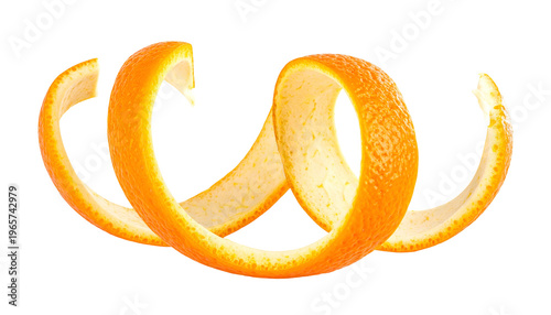 A peeled orange zest spiral floating against a black backdrop, brightly lit