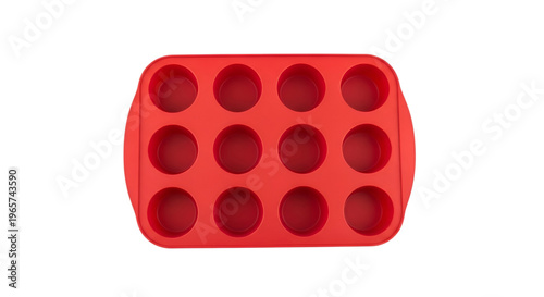 Red silicone muffin tray with 12 round cups on black background