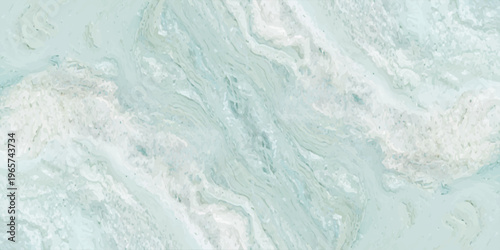 Abstract mint green and white liquid marble texture background. Fluid acrylic paint swirls with ethereal wavy patterns.