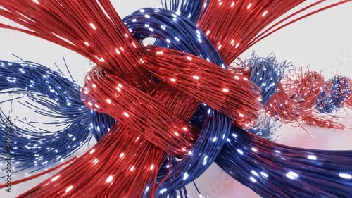 Intertwined strands of red and blue fiber optic cables are knotted together, with glowing tips creating a luminous effect against a clean background