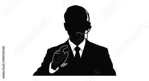 A sharply dressed man with a headset points forward a striking silhouette