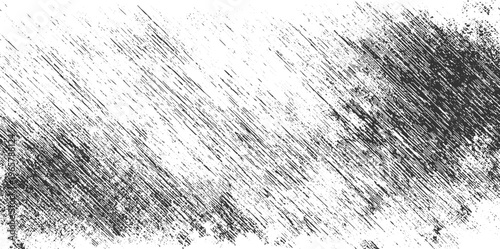 Black and white diagonal scratch texture with dense and sparse areas abstract background