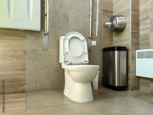 A modern public toilet equipped for people with disabilities