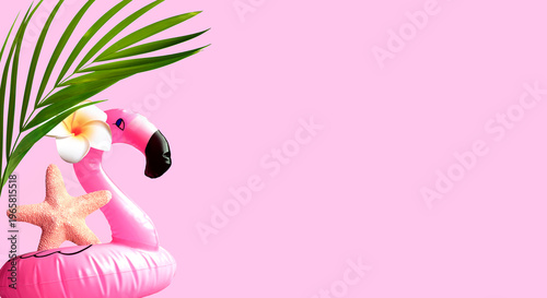 Summer tropical background with copy space for a text, pink flamingo with palm leaves
