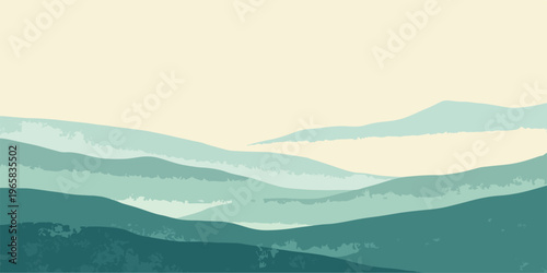 A misty summer sunrise casts a soft glow over the blue mountain landscape, where fog settles in the valley and clouds drift across the forest hills at dawn.