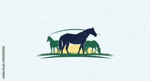 Silhouette of three horses on a grassy field with a yellow sun backdrop