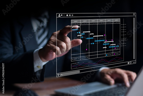 Businessman updating schedules or planning business online, appointment time management. Business planning calendar schedule concept.