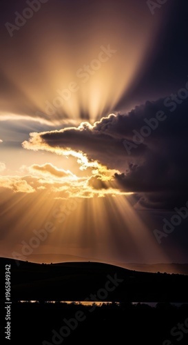 Dramatic Sunset with Rays of Light Breaking Through Clouds