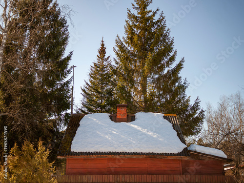 last snow melting on a rooftop