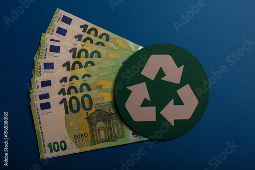 Fotografie Euro banknotes with recycle symbol, representing green finance, eco-friendly eco