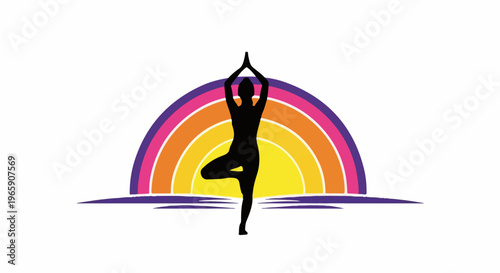Silhouette of person in tree pose before a rainbow over water