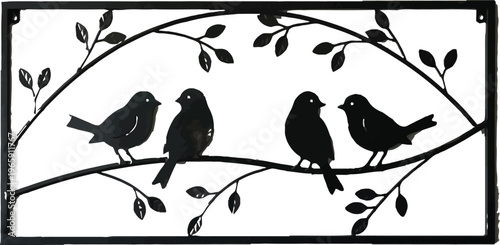 Decorative metal wall art with birds on a branch in a room