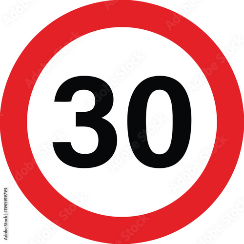 A speed limit sign displays 30 km/h in a circular red border on road.