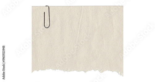 фотографія Torn beige paper note with textured edges and metal paperclip isolated on transp