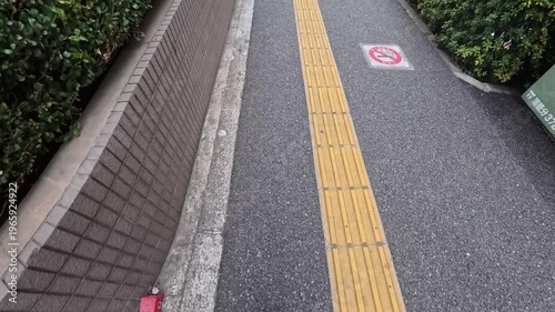 Close view walking on tactile paving blocks for visually impaired