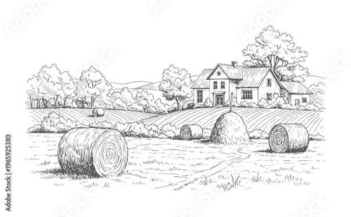 Black and white of rural farmhouse with hay bales in plowed field