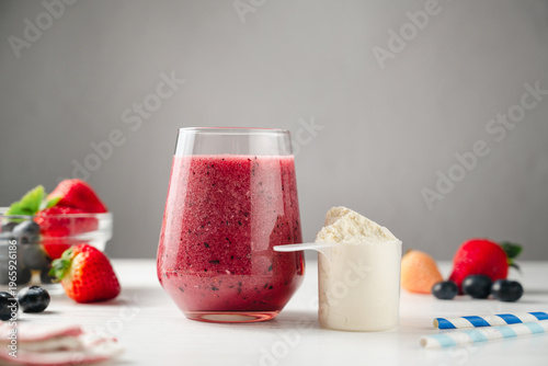Quadro em tela Berry protein loaded smoothie in a glass, made from fresh fruits and protein pow