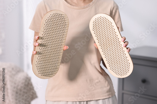 Photos Woman with sadhu boards at home, closeup