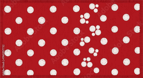 Red fabric texture with scattered white polka dots and fringed edges
