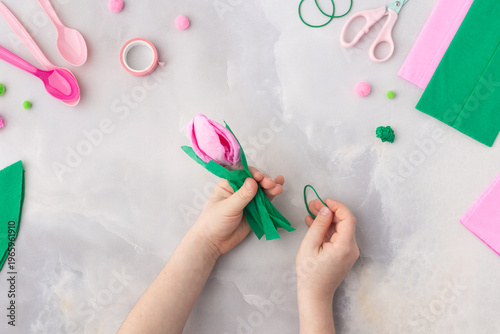 Easy flowers from spoons and crepe paper craft for kids. Hands. Mother's day. Happy birthday