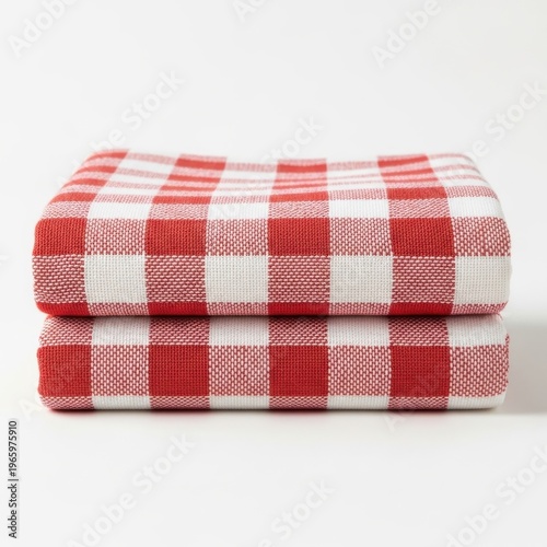 Stack of two red and white checkered cotton towels folded neatly on white background for home decor