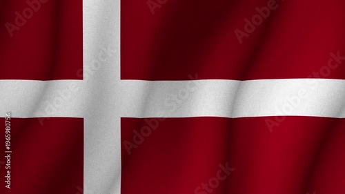 Flag of Denmark waving in wind with red background and white cross. National identity patriotism and country symbol concept.