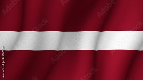 Flag of Latvia waving in wind with red and white horizontal stripes. National identity patriotism and country symbol concept.