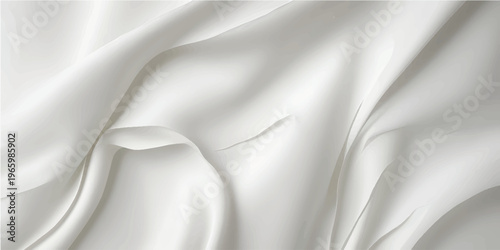 Smooth white silk and satin fabric texture creates a luxurious light backdrop with soft wavy curves and elegant shiny drapery for a decorative fashion textile material