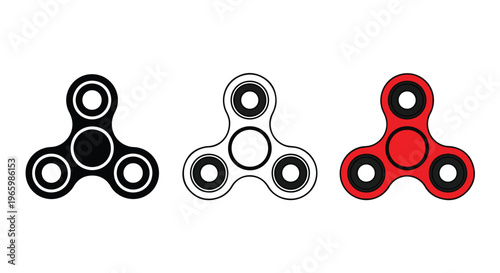 Close-up of three colorful fidget spinners in red, black, and white with spinning motion on a plain background