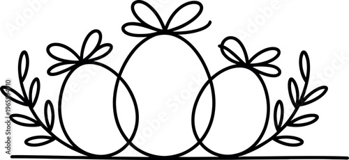 Three decorated eggs with bows and foliage sitting on a flat surface