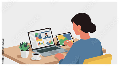 woman working on laptop and tablet.
