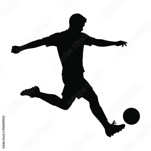 Soccer player kicking football in action pose