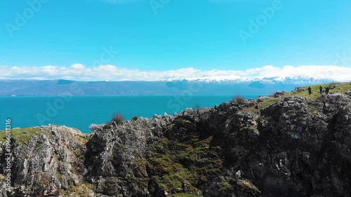 Village of Lin on the Rocky Peninsula Edge Along the Beautiful Shoreline of Lake Ohrid surrounded by emerald calm waters