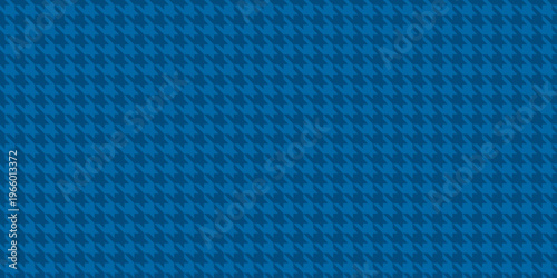 Bold blue houndstooth pattern.  Classic textile design ideal for backgrounds, website banners, fashion, or packaging. This seamless texture offers a sophisticated and timeless aesthetic.