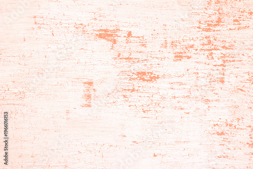 Vintage distressed peach paint peeling off white wood surface texture background