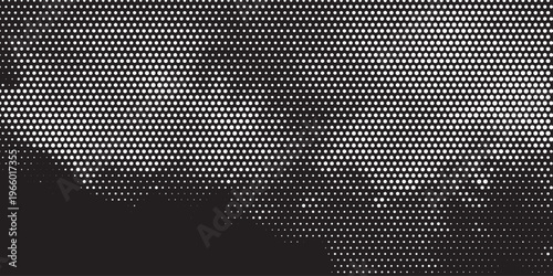 Abstract black background with white halftone dots pattern gradient