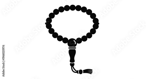 Black prayer beads with a tassel a striking silhouette