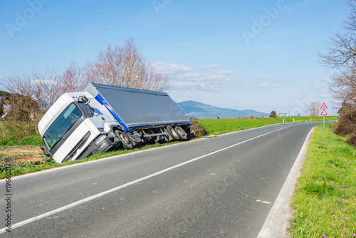 Quadro su tela A truck ended up in a ditch on the side of a country road, Collesalvetti, Italy