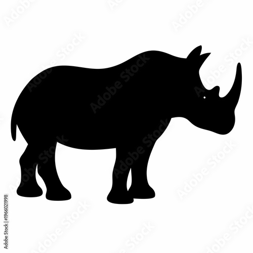 Silhouette of a magnificent rhinoceros standing strong against a plain background