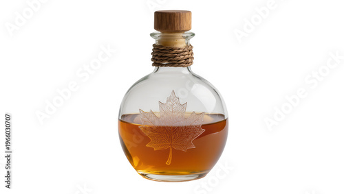 Cuadro en lienzo Golden amber maple syrup in engraved glass bottle with wooden cork and braided t